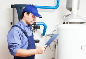 plumber repairing common water heater problems