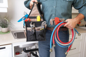 Wimpy's finishing a plumbing service call